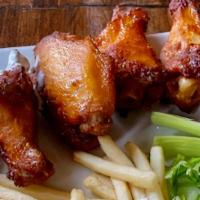 Chicken Wings With Fries · Mango habanero, original buffalo or BBQ sauce served with carrots, celery, and ranch dip.