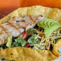 Southwest Chicken Salad · Sliced grilled chicken breast, crisp romaine tossed with sweet corn, black beans, diced toma...