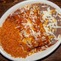 Enchiladas (2) · Hand rolled corn tortillas stuffed with cheese and red sauce for shredded chicken or beef or...