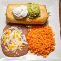 Chimichanga · Prepared with large flour tortilla filled with cheese, choice of shredded chicken, beef or p...