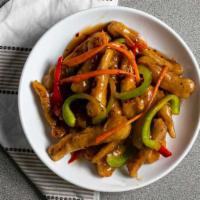 Vegan Ginger Stir Fry · Your choice of tofu or vegetables stir fried with ginger, garlic, onions, and herbs.