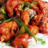 Chili Chicken · Shredded boneless chicken sauteed with garlic, onion, green bell peppers, and green chili an...
