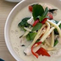 Green Curry · Spicy. Green curry paste with coconut cream, broccoli, bell pepper, bamboo shoot and sweet b...