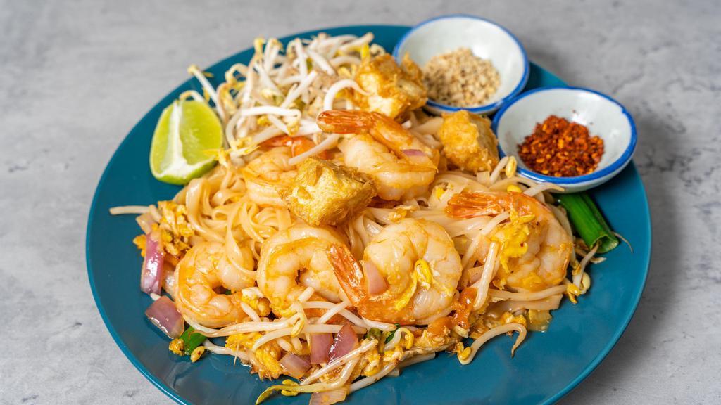 Pad Thai · Favorite. Stir-fried rice noodle with pad Thai sauce, egg, tofu, shallot, sweet pickle turnip, bean sprout, and green onion, served with fresh bean sprout, ground peanut and sliced lime.
