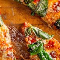 Margherita Slice · Olive Oil, Plum Tomato, fresh Basil and a Blend of Cheeses.