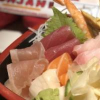 Chirashi · Chef’s choice of sashimi served over delicious sushi rice.