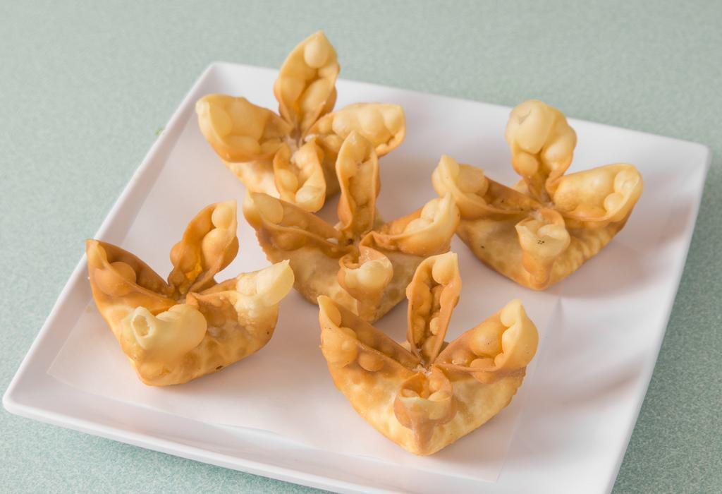 Crab Rangoon · Five crisp golden wonton wrappers filled with cream cheese and imitation crab.