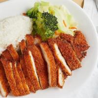 Chicken Katsu · Panko breaded and deep fried chicken. Served with steamed rice and stir-fried vegetables.