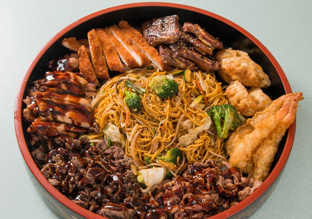 Happy Combination Four · Serves FOUR. Largest platter of rice, vegetable yakisoba, chicken teriyaki, beef short ribs, beef teriyaki, happy shrimp, gyoza, and chicken katsu. Served with steamed rice and stir-fried vegetables.