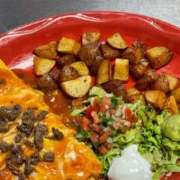 Sancho'S Omelet · Our Omelet smothered with green chili and topped with a choice of meat: Asada, Bacon, Ham or...