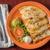 Quesadilla · A fresh flour tortilla filled with cheese and optional meat (pollo, al pastor, or asada) ser...