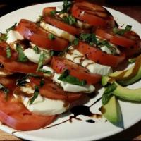 Caprese Salad · Fresh mozzarella, tomatoes, fresh basil, olive oil & balsamic vinegar dressing.
