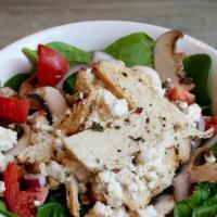 Spinach Salad · Spinach, tomatoes, red onions, mushrooms, feta, and house Italian dressing.
