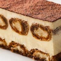 Italian Tiramisu · Layers of espresso drenched lady fingers separated by mascarpone cheese and dusted with coco...