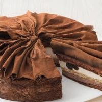 Black Forest Cake · Chocolate sponge cake surrounds a layer of chocolate and chantilly cream, studded with amare...
