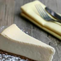 Ny Cheesecake · Vanilla enhanced classic cheesecake, wonderful completion to any meal.