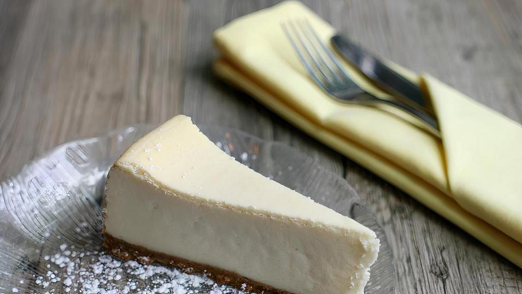 Ny Cheesecake · Vanilla enhanced classic cheesecake, wonderful completion to any meal.