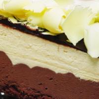 3 Chocolate Mousse Cake · White and dark chocolate mousse on a sponge base, coated with a chocolate hazelnut glaze and...
