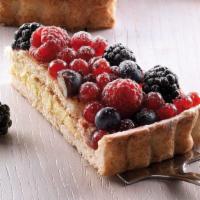 Mixed Berry Tart · Short crust pastry base filled with pastry cream, topped with a layer of sponge cake and lav...