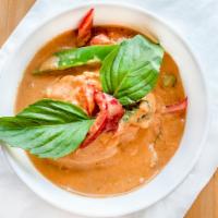 Red Curry · Spicy. Red curry with bamboo shoots, bell peppers, sweet basil and coconut milk.