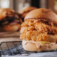 Fried Chicken Sandwich · Crispy chicken, pickles, toasted bun, and Twisted BBQ Ranch sauce.