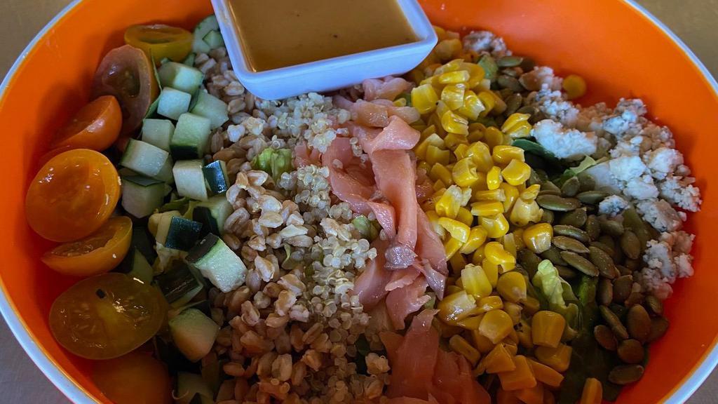 Little O'S Chopped Salad · Romaine, smoked salmon, corn, pepitas, farro, quinoa, tomato, cucumber, bleu cheese, chile lime dressing.