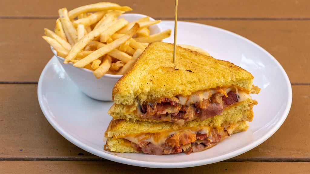 Brewer'S Grilled Cheese · Roasted pork, bacon, tomatoes, jack & cheddar cheeses, IPA honey mustard.