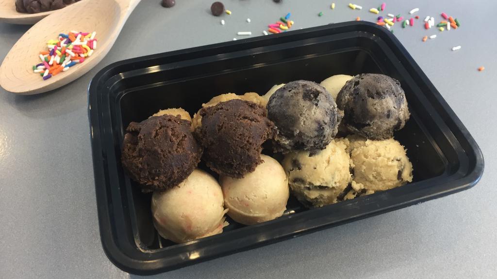 Sampler Pack · Two bite-sized scoops of each of six flavors – chocolate chip, sugar, cake batter, cookies, and crème, brownie, peanut butter.