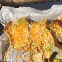 Soft Taco Basket (3) · Three soft tacos filled with a choice of marinated steak, or marinated chicken. Topped with ...