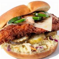 Jalapeno Cluck · Deep fried Nashville chicken, Pickled jalapeno's, Pepper jack cheese, pickles, home made col...