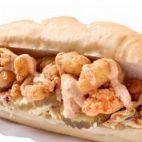 Po'Boy Shrimp · Deep fried shrimp, pickles, on a bed of homemade coleslaw with our delicious Cluck sauce on ...