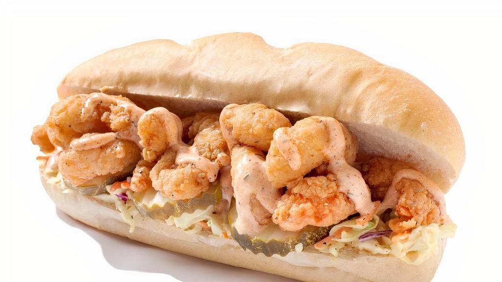 Po'Boy Shrimp · Deep fried shrimp, pickles, on a bed of homemade coleslaw with our delicious Cluck sauce on top.