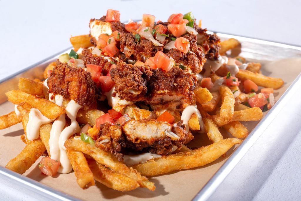 Dirty Bird Loaded Fries · WOW! Get ready to enjoy a large side of fries, queso blanco sauce, with 6oz of Nashville Hot Chicken on top. Topped with a side of Pico De Gallo. YUM!