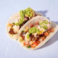 Cluckles Ole' · Two tacos with 3oz Nashville Hot Chicken in each taco , on a bed of coleslaw, cheese, pico d...