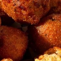 Hushpuppies · A delicious side of (8) Hush puppies to enjoy!