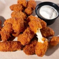 Spicy Cheese Curds · Spicy Breaded Wisconsin Cheese Curds are made with fresh Wisconsin cheese curds and lightly ...