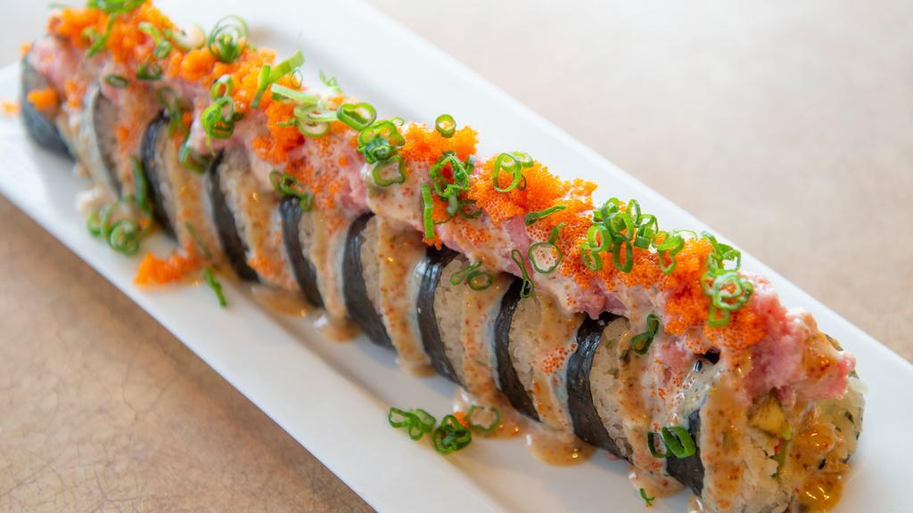 Musashi Roll · 10 pcs. California Roll topped with Flying Fish Roe, Green Onions, and Spicy Mayo.