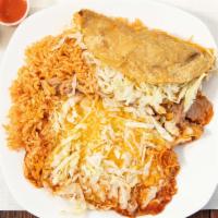 #20- Taco & Enchilada · Shredded beef taco with lettuce and cheese and a cheese enchilada with lettuce served with r...