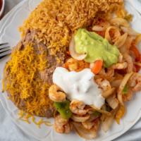 Camarones Rancheros (Shrimp) Combination · Shrimp with bell peppers, tomatoes, and onion. Served with guacamole, sour cream, lettuce, b...