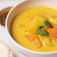 Yellow Curry · Dairy free, vegan, gluten free. Mild yellow curry paste cooked in coconut milk with carrot, ...