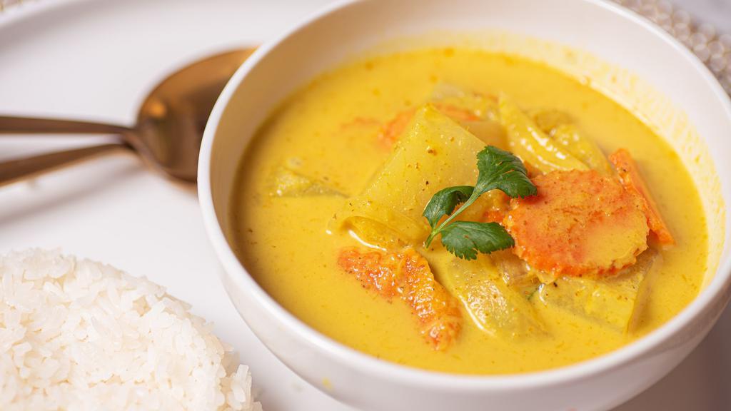 Yellow Curry · Dairy free, vegan, gluten free. Mild yellow curry paste cooked in coconut milk with carrot, potato, and onion. Gluten-free.