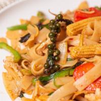 Drunken Noodle · Wide rice noodle stir-fried with garlic, broccoli,  carrots, onion, basils, baby corn,  bell...