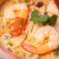 Creamy Tom Yum Noodle Soup · Rice noodle and choice of protein in creamy hot and spicy soup with mushroom, tomato, green ...