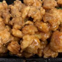 Orange Chicken · Battered, and fried chicken coated in a sweet orange-flavored sauce.