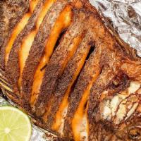 Pescado Frito (Fried Fish) · A whole tilapia 