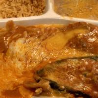 Chiles Rellenos · Poblano chiles, careful sometimes hot, stuffed with jack cheese, dipped in egg batter and si...