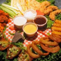 Felt Sampler · Chicken tenders, cheese sticks, half lb. of wings, onion rings, potato skins and cheese ques...