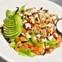 Blackened Chicken Salad · A tasty lettuce blend with blackened chicken, avocado, tortilla strips, tomatoes and our chi...