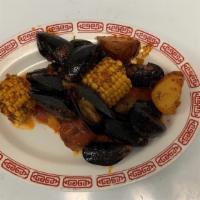 Black Mussels 1Lb · with 2pc corn 2pc potatoes
