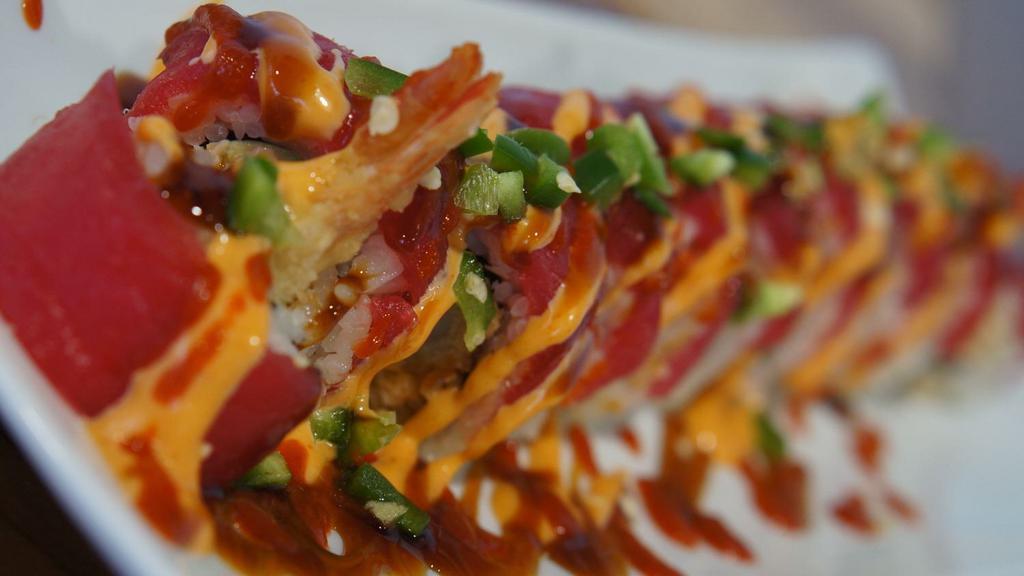 Blazin' Tuna  Roll · Tempura shrimp, cucumber, and crab salad, 
topped  tuna,  spicy mayo, sushi sauce, sriracha sauce,  jalapeños